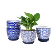 Selamica vintage blue front view showing four pots and saucers, decorative appeal