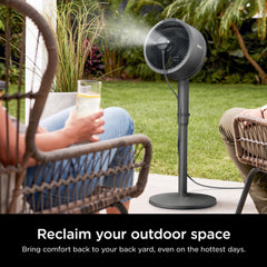 Shark InstaCool producing fine mist over patio, keeping outdoor space cooler