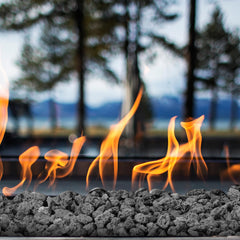 Skyflame lava rocks mixed with fire glass showing decorative contrast and flame enhancement