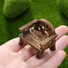 Skylety miniature table and chairs staged in a fairy garden showing visual storytelling benefit