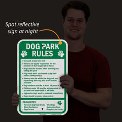 SmartSign held next to hand showing compact size and portability benefit