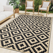 Smiry front view of black and beige rug showing boho pattern and durable finish