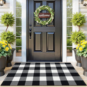 SofterCharm front view black and white checkered rug shows modern entry warmth