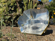 SOL COOK front view folded for compact transport and quick setup benefit