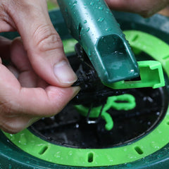 STYDDI sprinkler active on lawn showing wide coverage benefit