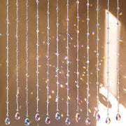Suncalla front view of 12 transparent garland strands showing full set sparkle