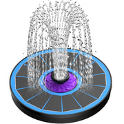 SZMP front view blue fountain showing complete floating unit and spray — decorative focal point
