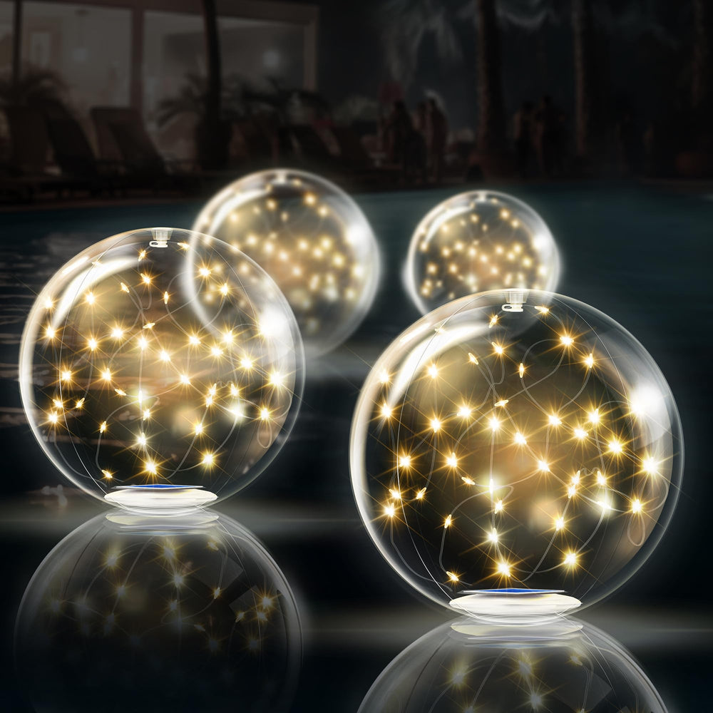 TIALLY front view of four warm-white floating pool lights showing ready-to-use set