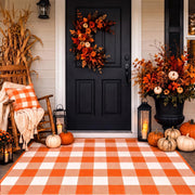 Tinideya front porch display showing orange plaid welcoming guests