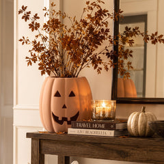 Tioncy planter filled with succulents on mantel for cozy seasonal display