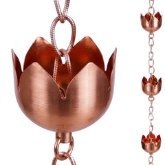 Topadorn front view showing full 8.5 ft rain chain and lotus cups enhancing facade