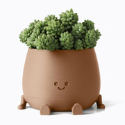 TOPOLA happy face planter front view showing cheerful design and khaki color benefit: brightens spaces