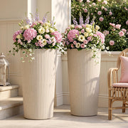 Trygoal front view of two cream tall planters showing elegant vertical lines and curb appeal