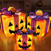 TURNMEON front view showing three pumpkin gift box sizes and glowing LEDs