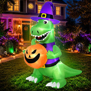 TURNMEON front view of witch dinosaur showing costume and pumpkin, high visual impact