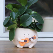 UMESONG smiley face planter front view showing cheerful design and decor benefit