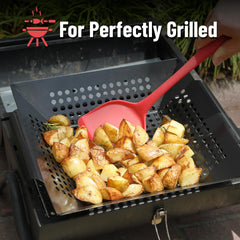 UNCO grill basket filled with vegetables on grill demonstrating even charring and containment