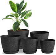 Utopia Home front view of five spotty black planters showing modern design and coordinated styling