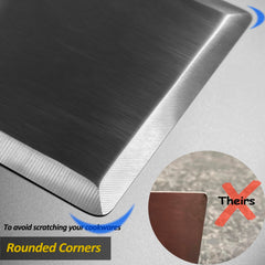 Vovoly spatula edge bevel closeup demonstrating thin rounded bevel for smooth sliding under food