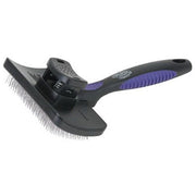 Weaver Livestock brush front view showing 4-inch head and no-slip grip for control