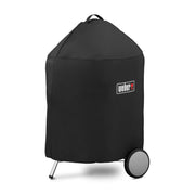 Weber 22" charcoal grill cover front view protecting grill outdoors