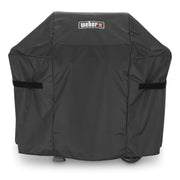 Weber front view showing fitted cover protects grill from elements
