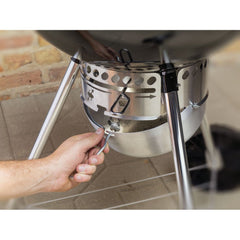 Weber one-touch cleaning system ash catcher pictured for fast and tidy ash removal