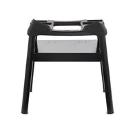 Weber Q compact stand front view showing stable base and elevated grill for ergonomic cooking