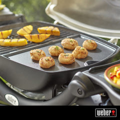 Weber griddle cooking pancakes evenly for easy breakfast outdoor cooking