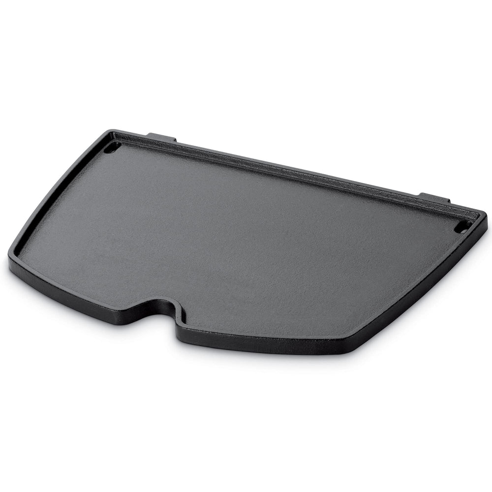 Weber griddle front view showing flat top and even cooking area for versatility