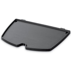 Weber griddle front view showing flat top and even cooking area for versatility