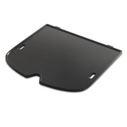 Weber Traveler griddle front view showing smooth cooking surface and fit benefit