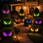 Woanger front view of glowing eye pairs showing bright colorful LEDs and yard impact