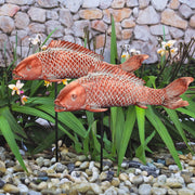 Wosuine front view pair koi statues showing outdoor charm and balance