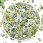 YISZM front of bag showing 2lb polished jade pebbles and clear packaging benefit