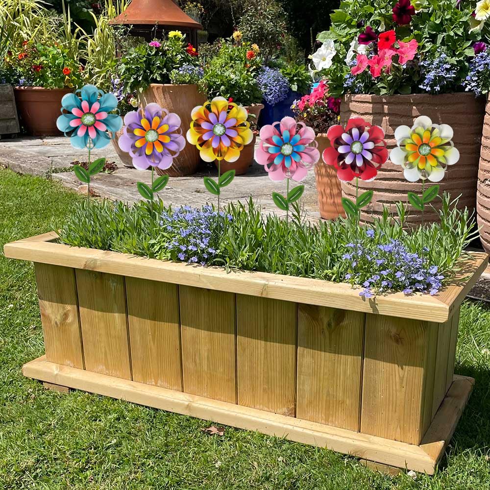 ABELOTS stake held beside hand to show scale and easy placement