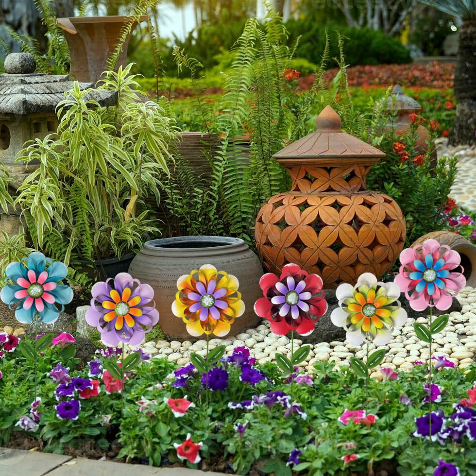 ABELOTS metal flower stakes placed in planter adding instant color