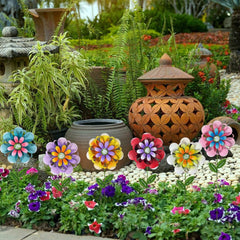 ABELOTS metal flower stakes placed in planter adding instant color