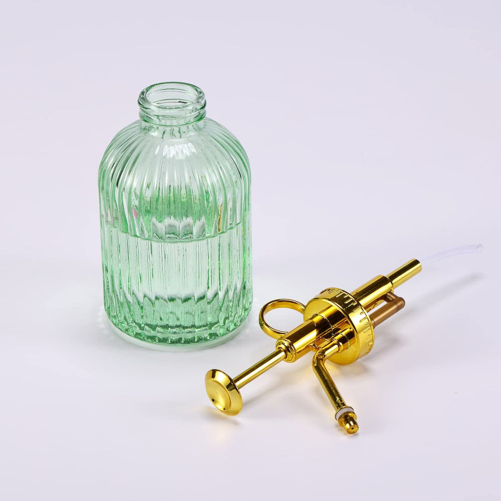 Aebor pump nozzle close-up showing fine mist mechanism for gentle watering