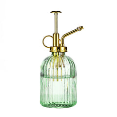 Aebor green and gold mister front view showing elegant design and plant care appeal