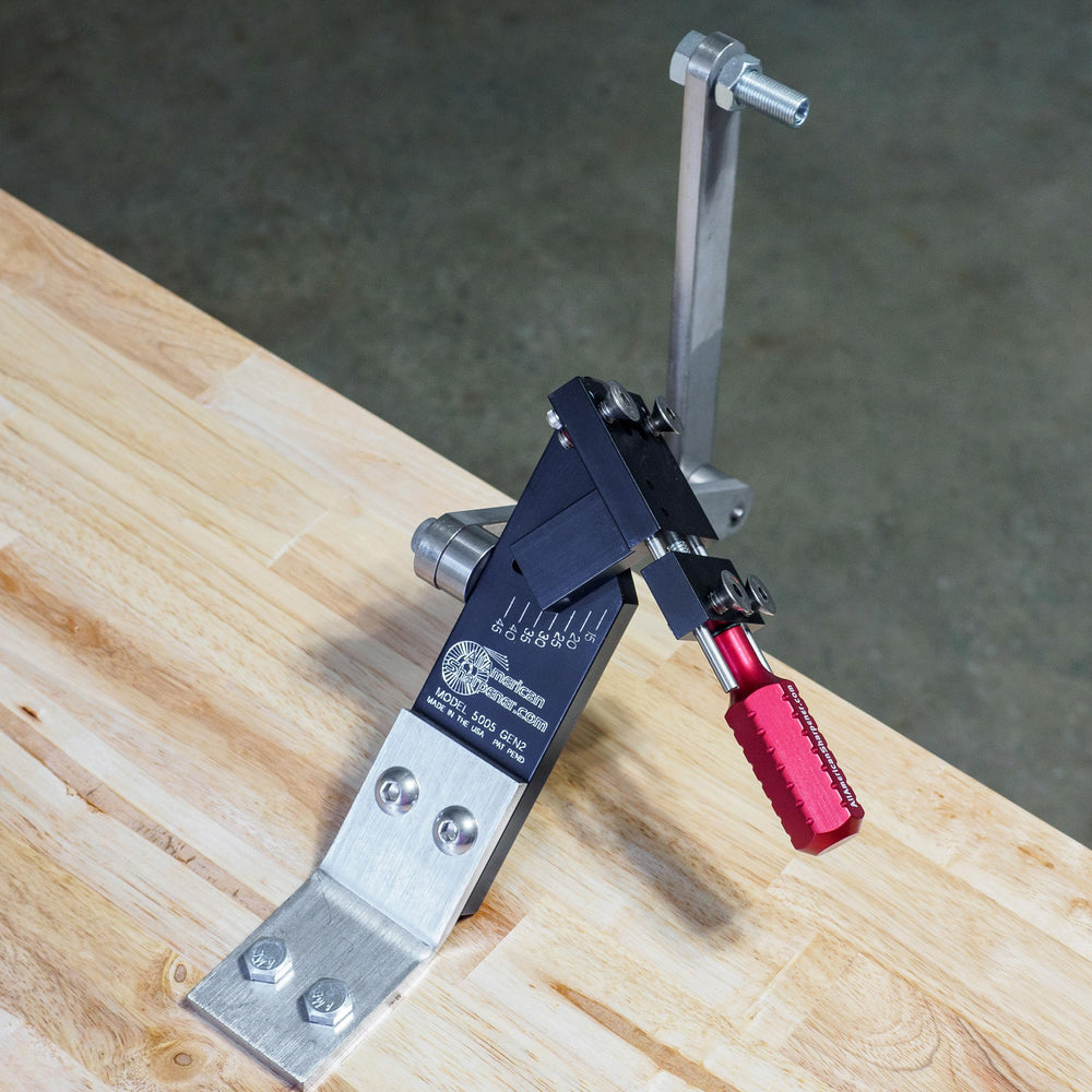 All American Sharpener fastening clamp detail showing secure blade hold and safety