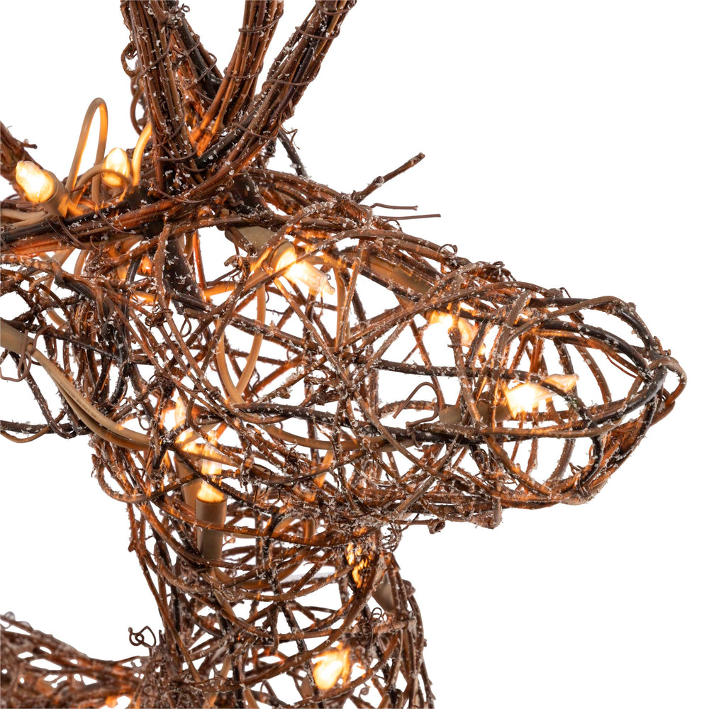 Alpine Corporation reindeer on porch creating welcoming holiday entrance