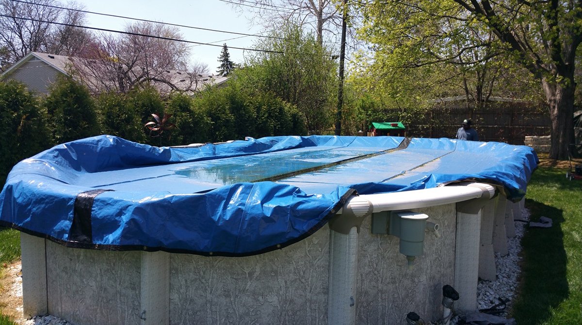 Aquador installed on above-ground skimmer demonstrating winter protection