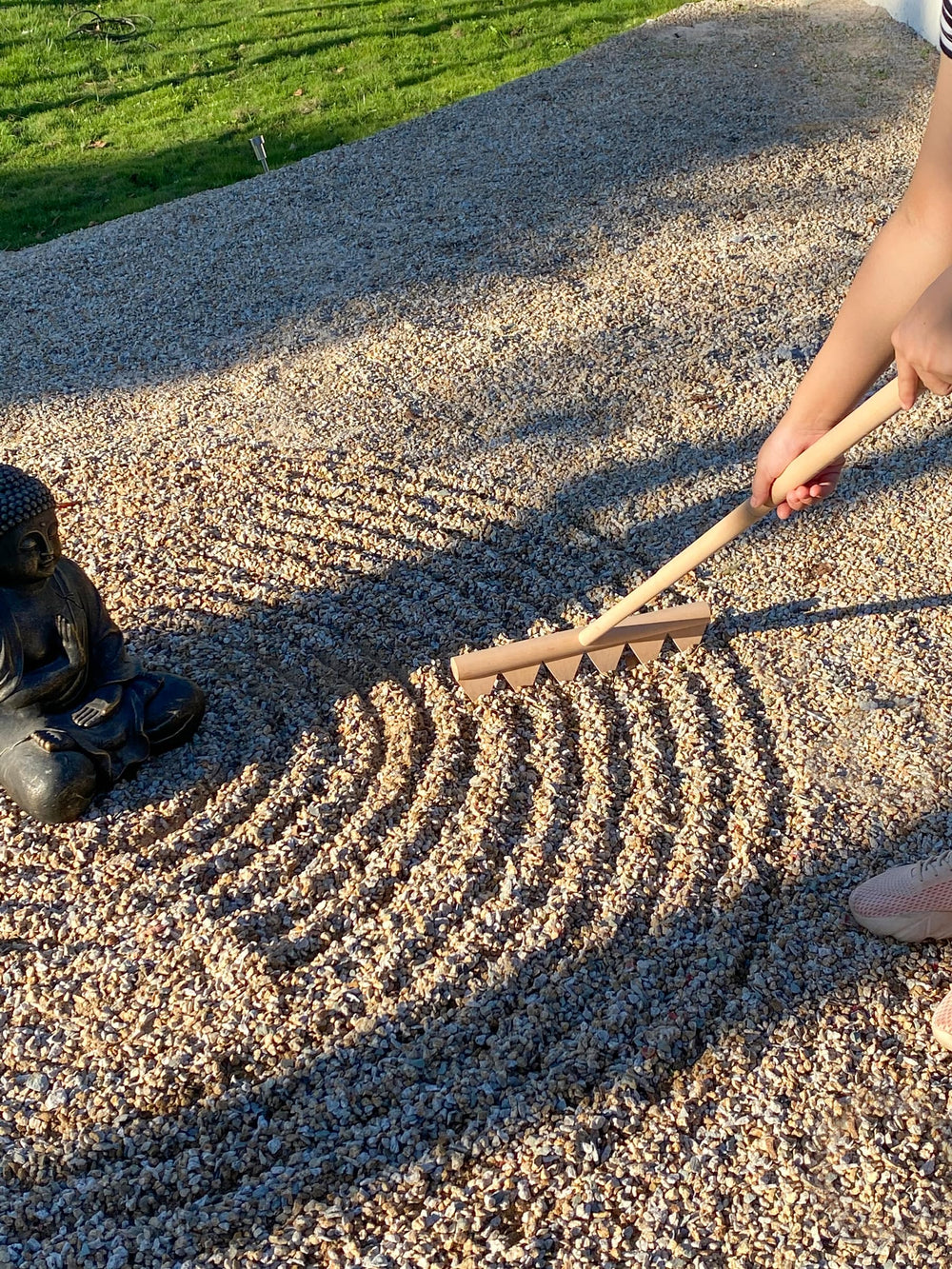 BangBangDa assembled rake beside a tape measure showing 48-inch length for scale and reach