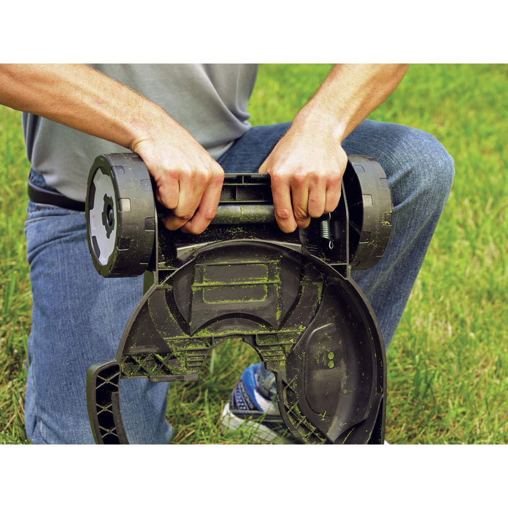 BLACK+DECKER MTD100 installed on trimmer mowing a small yard for efficient results