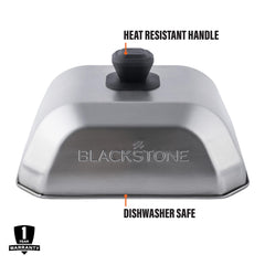 Blackstone cover on griddle trapping steam to melt cheese quickly