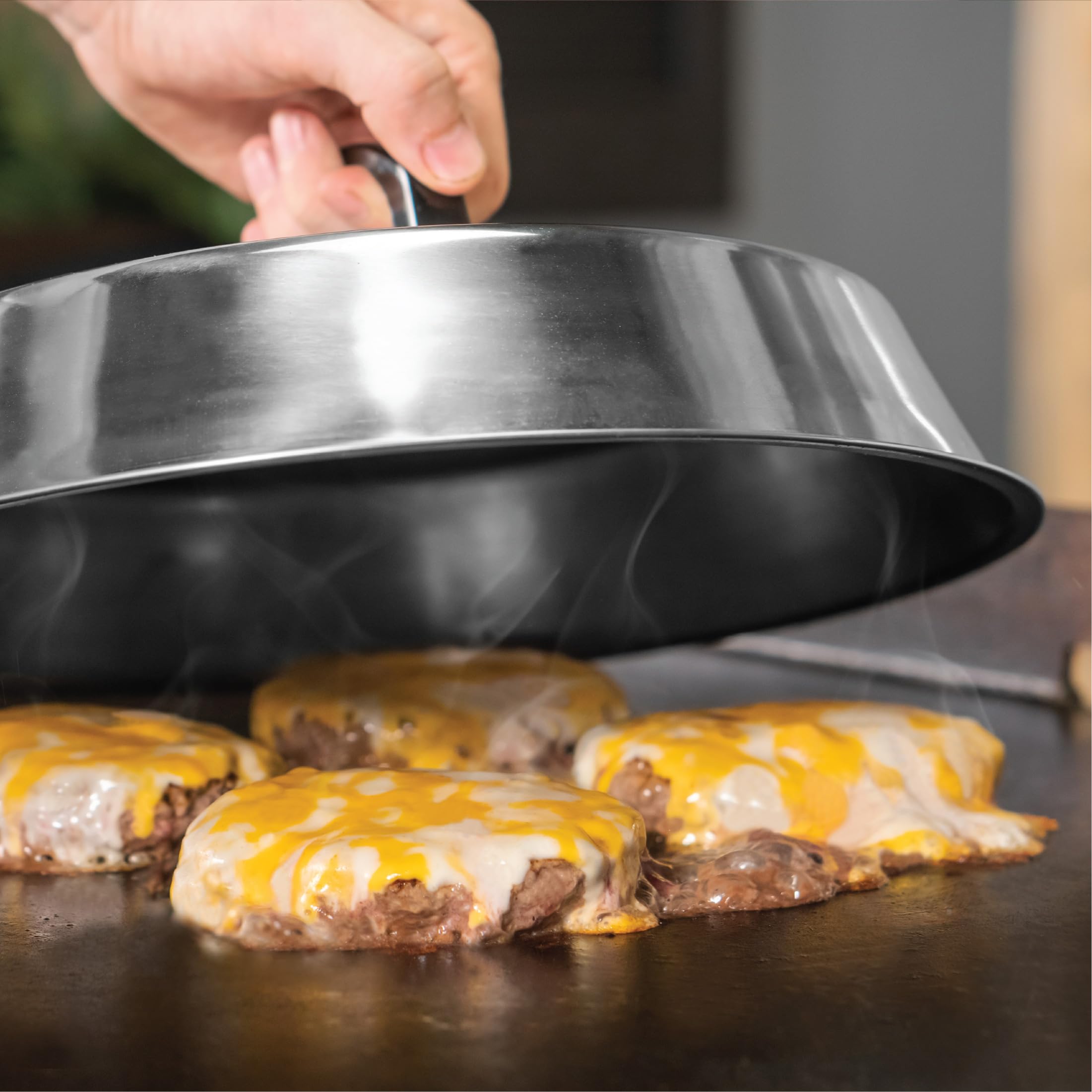 Blackstone heat-resistant handles detail demonstrating safe comfortable grip