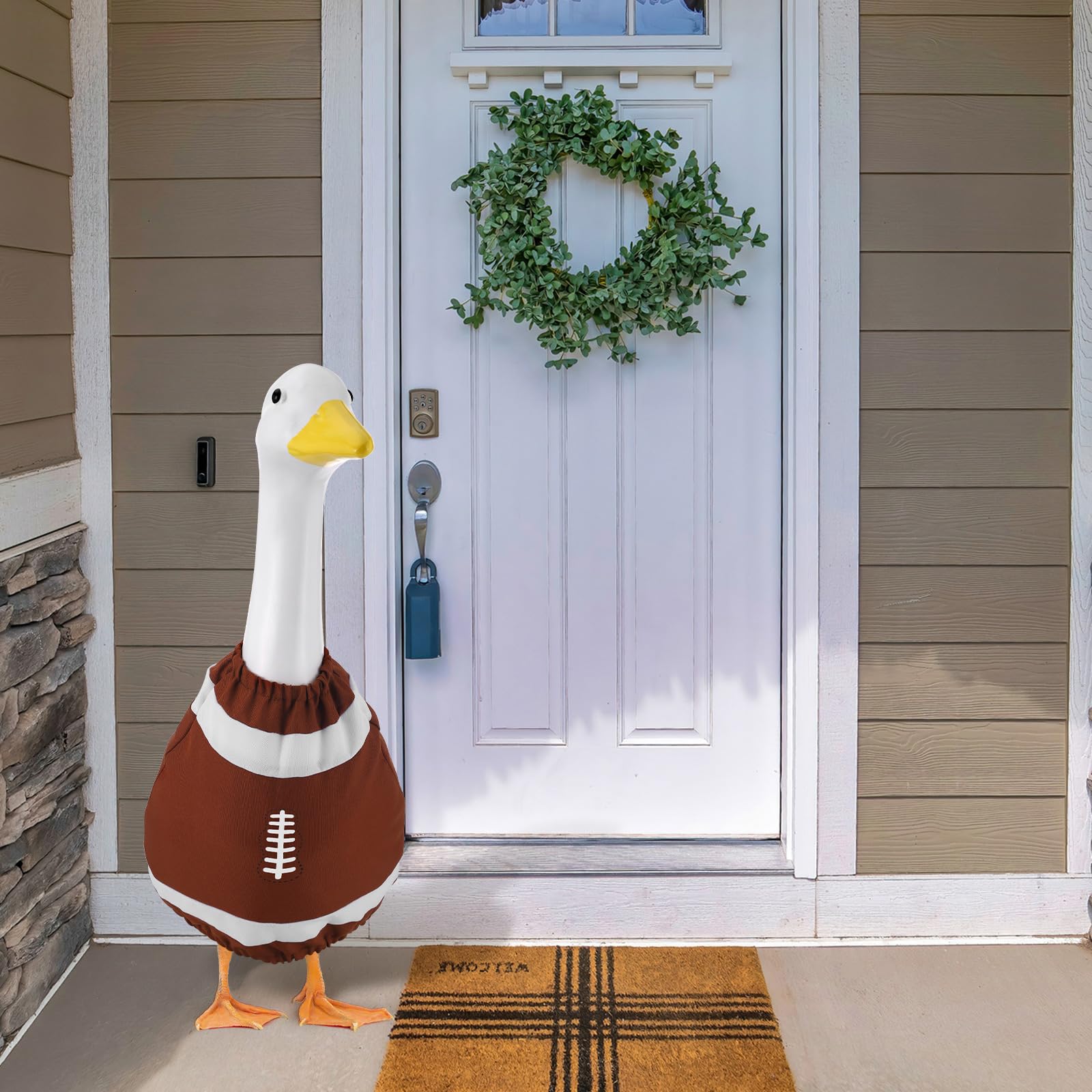 Booson side profile of dressed goose on porch demonstrating festive look