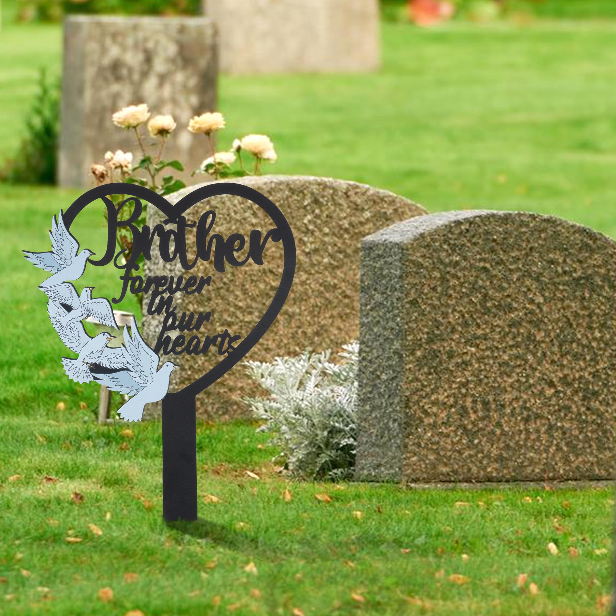 BUoonyer memorial placed in garden with flowers evoking peaceful remembrance