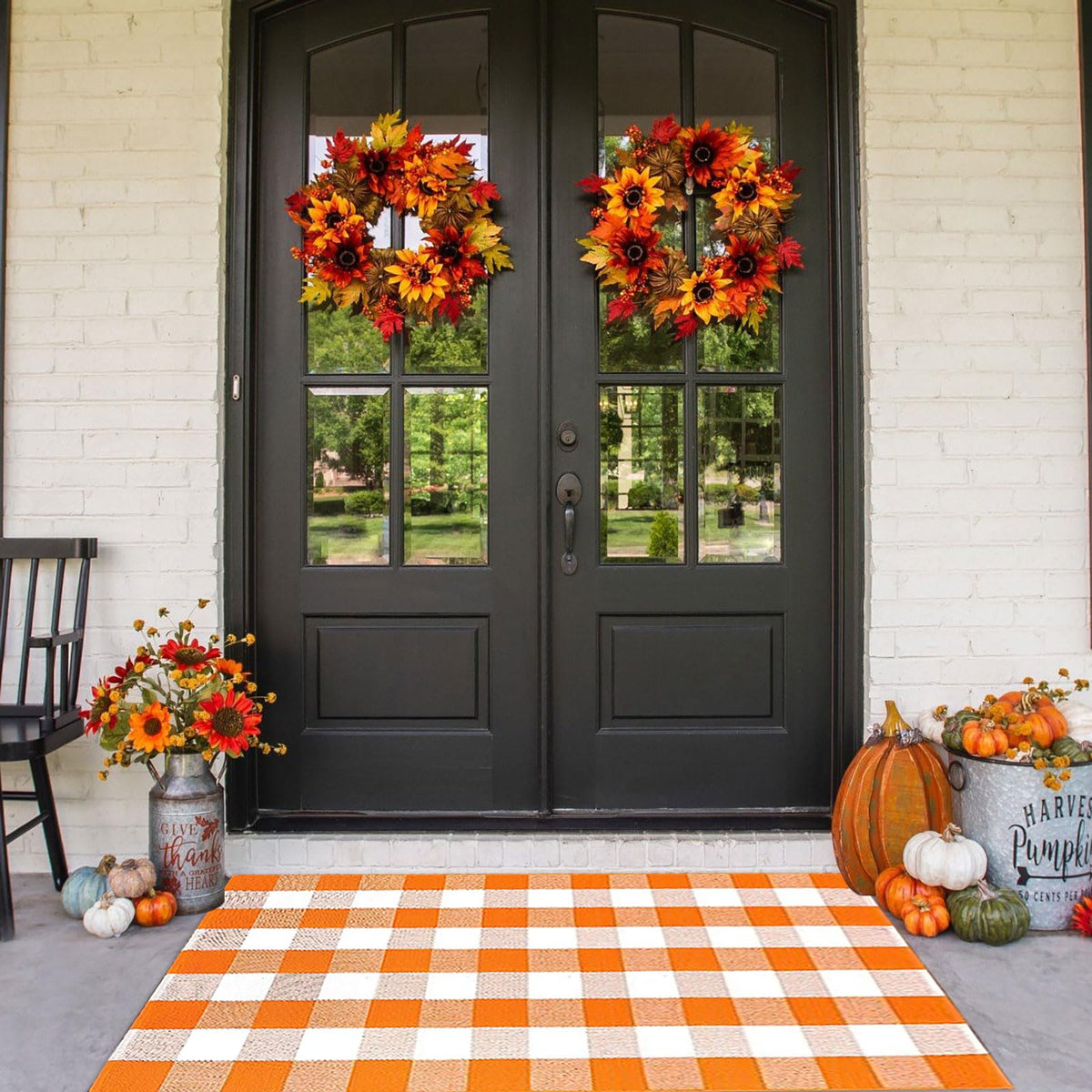 CAINANEL front porch overview showing orange buffalo plaid welcoming guests